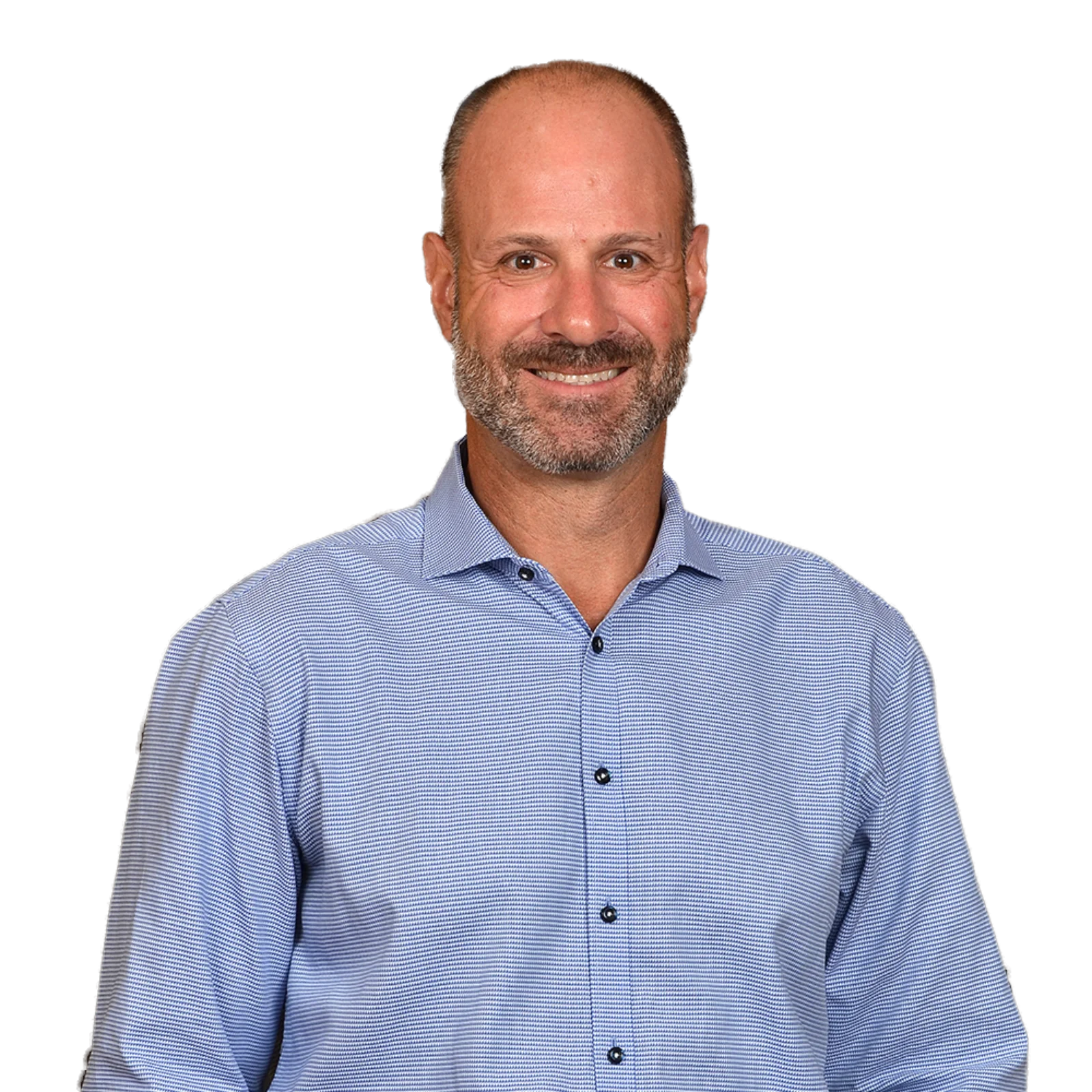 Portrait of Michael Pizzo wearing a light blue patterned shirt, smiling with a relaxed and approachable expression.