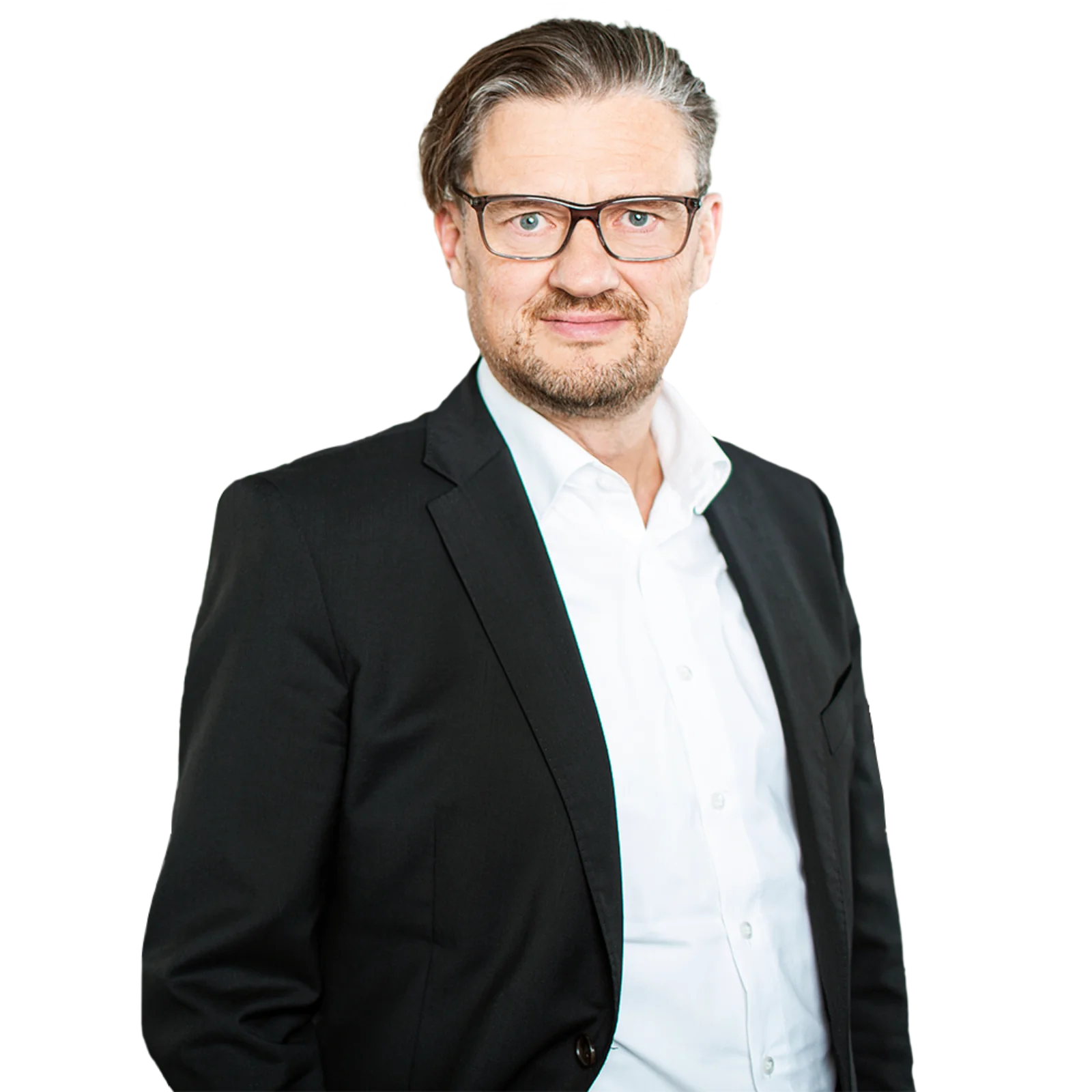 Professional portrait of Markus Mueller wearing glasses and a black blazer over a white shirt, standing confidently.