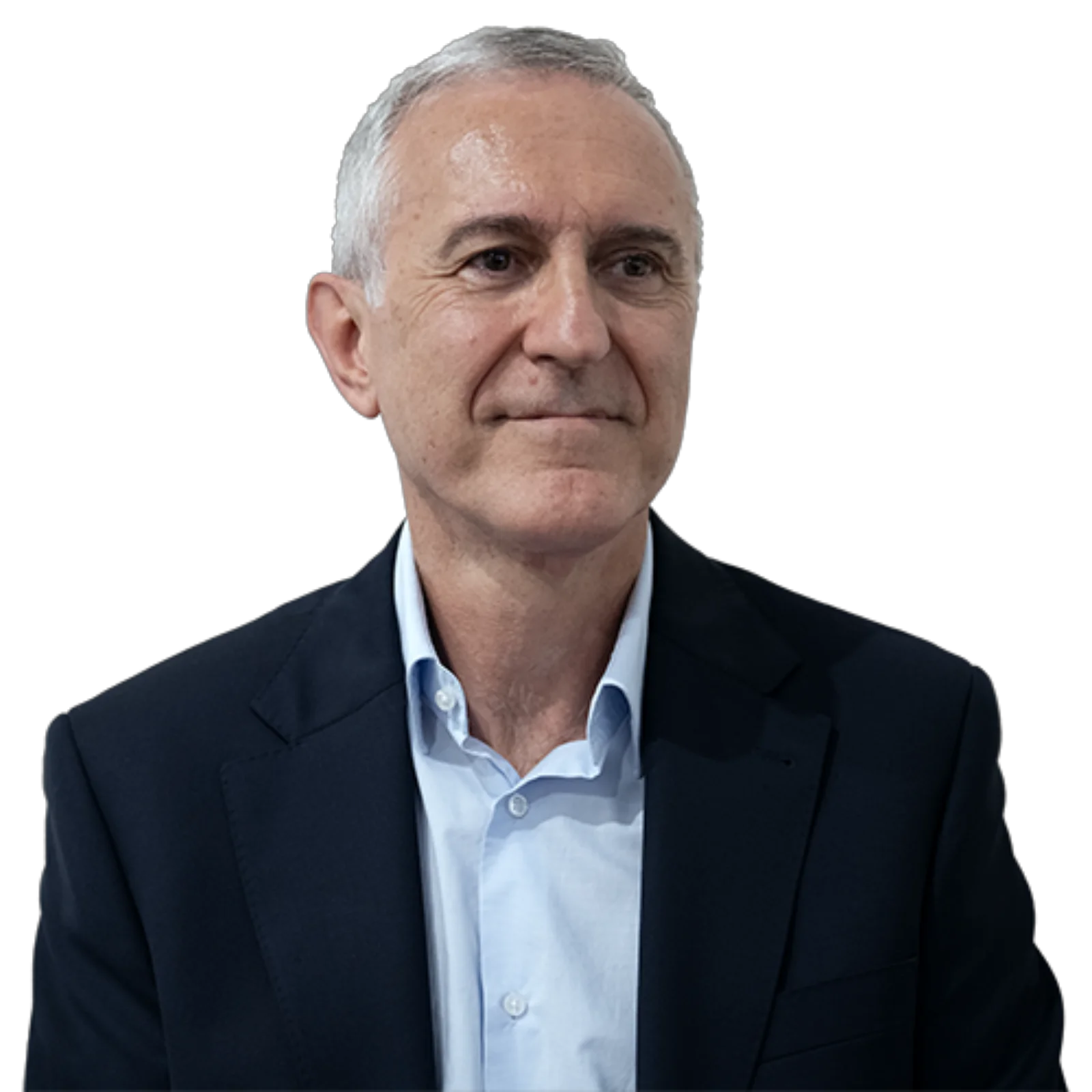 Portrait of Guillermo Rodrigues wearing a dark blazer and light blue shirt, facing slightly to the side with a thoughtful expression.