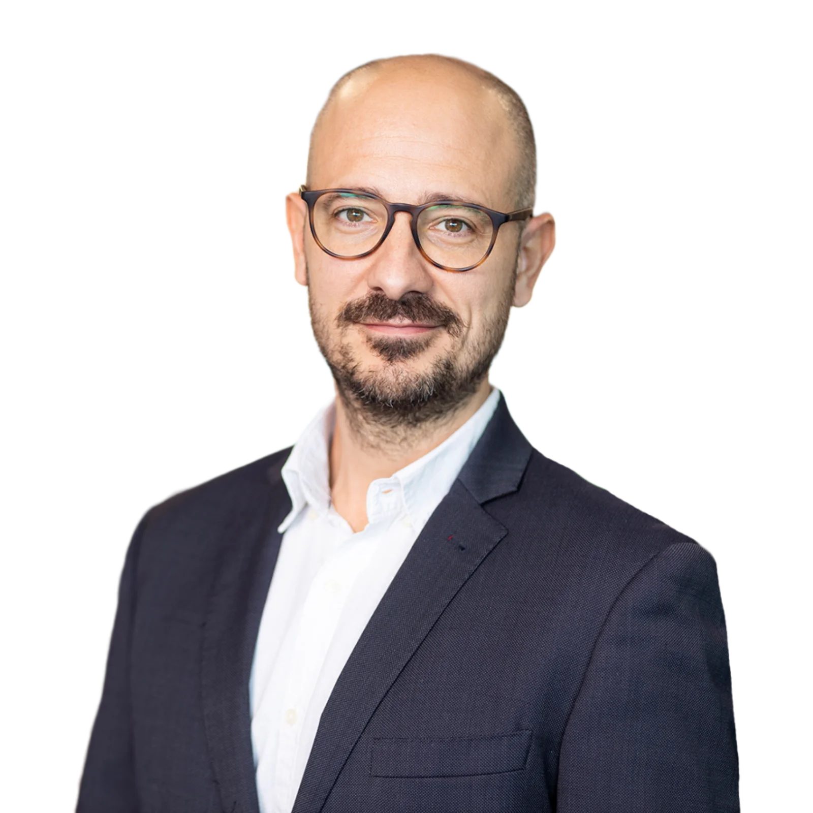 Professionelles Porträtfoto von Ignasi Barri mit Brille, dunklem Anzug und hellem Hemd und selbstbewusstem und nachdenklichem Gesichtsausdruck.