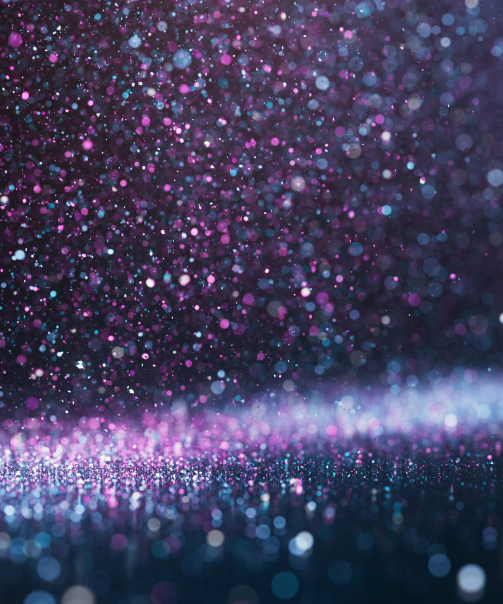 Abstract image featuring a glittering background with a mix of purple, blue, and white sparkles, symbolising the celebration of excellence and achievements.