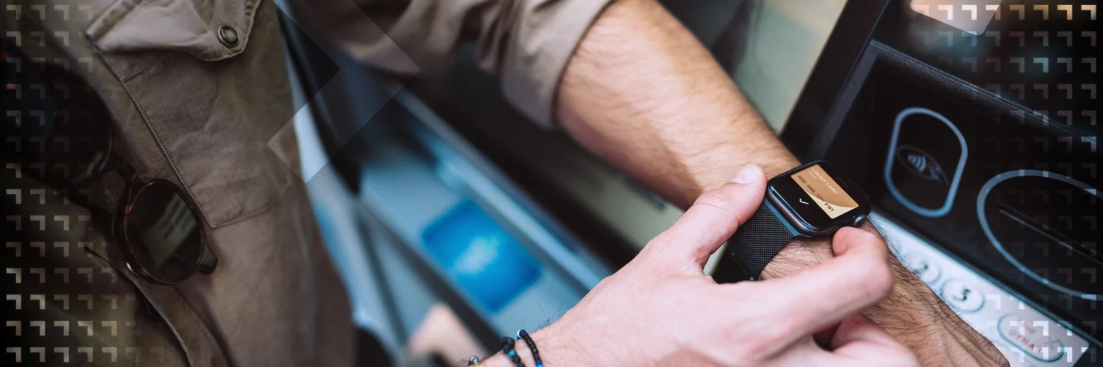 Close-up of a person using a smartwatch to interact with a modern vehicle&#039;s system, showcasing seamless technology integration in automotive design.