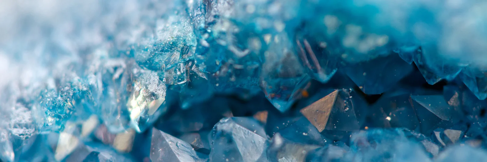 Close-up of blue crystal formations, symbolising the strength and clarity of a new cloud-based deposit platform.