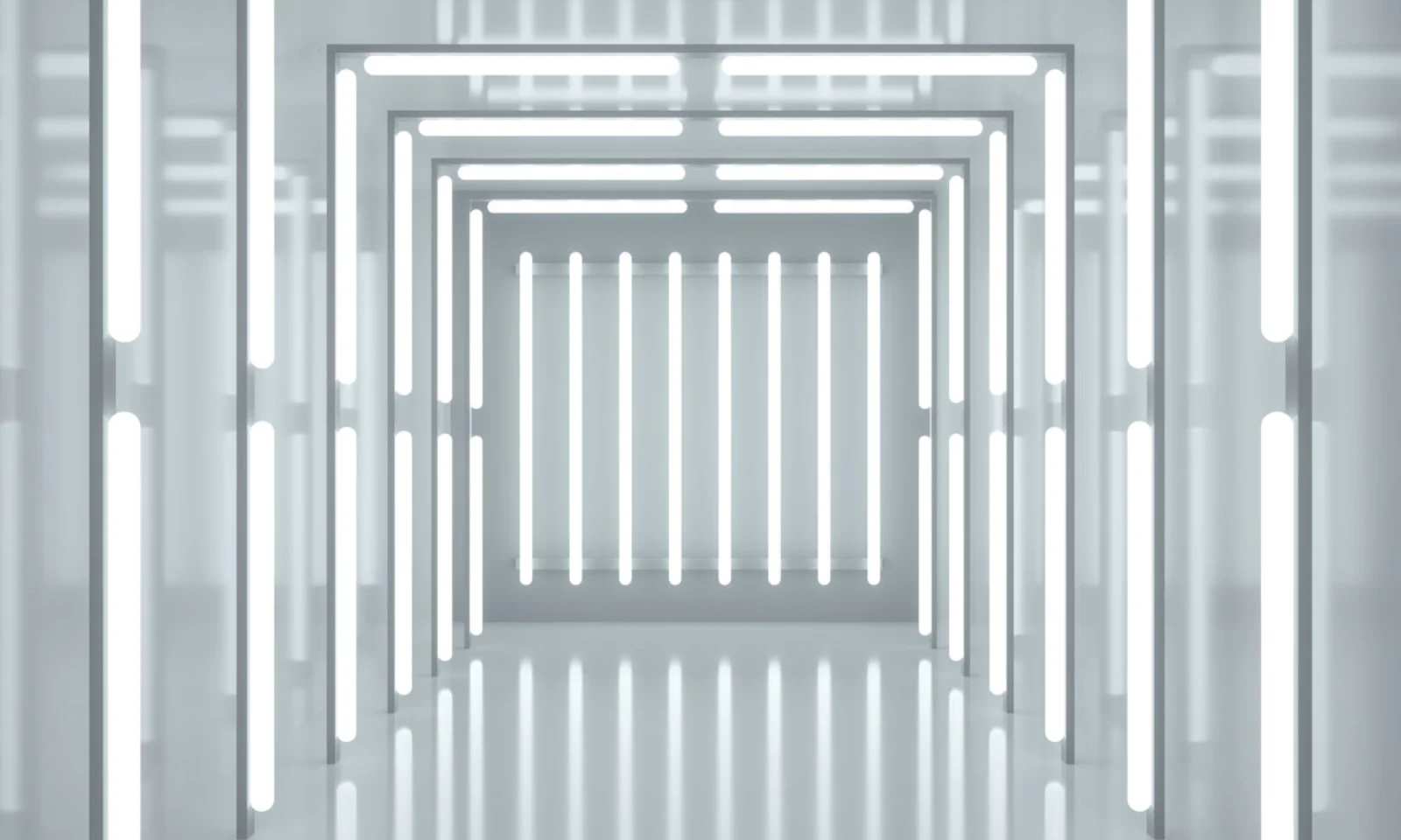 A futuristic corridor illuminated by linear LED lights, creating a tunnel-like effect with reflections on the floor.