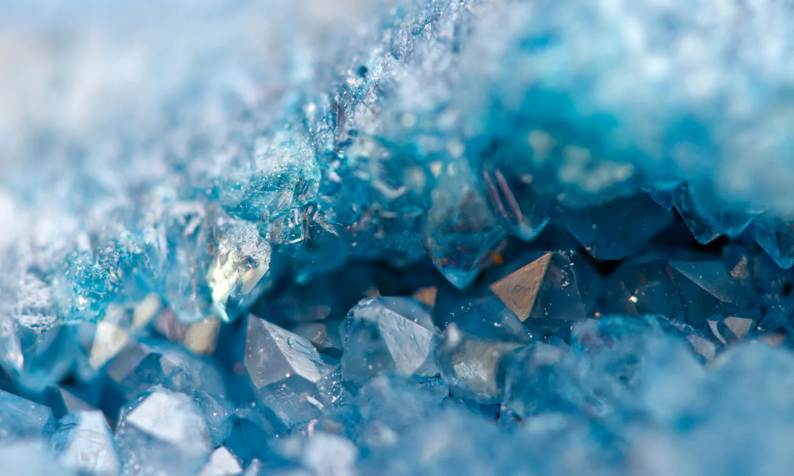 Close-up of blue crystal formations, symbolising the strength and clarity of a new cloud-based deposit platform.