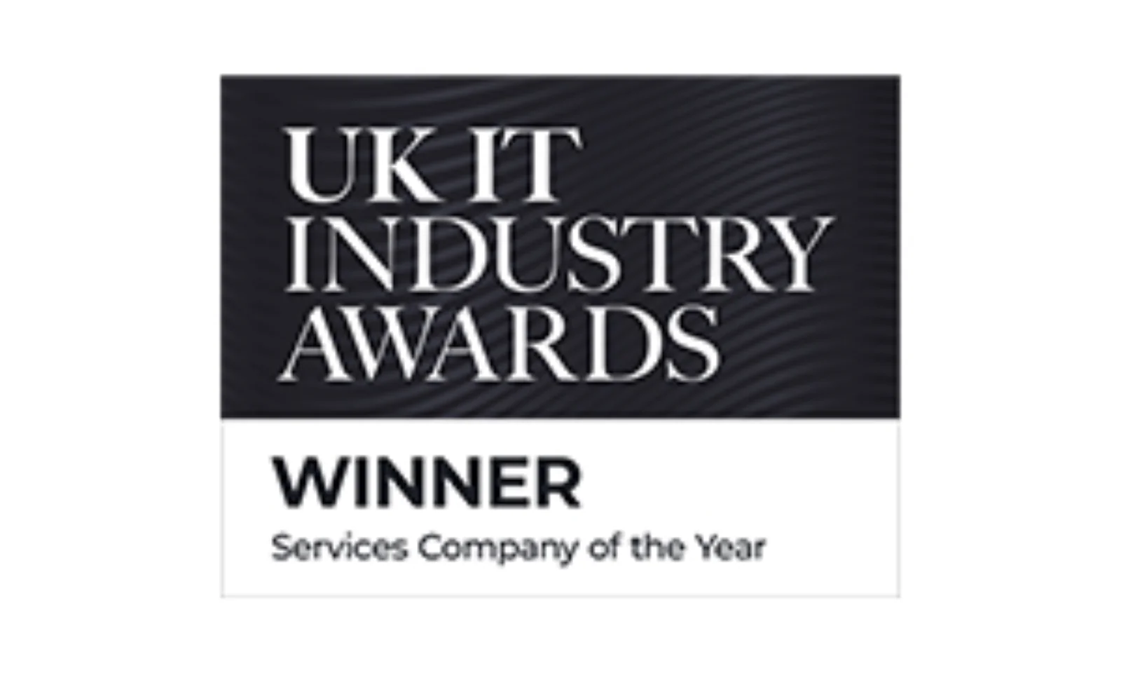 Image of the UK IT Industry Awards winner badge for Services Company of the Year, featuring a black and white design with bold text.