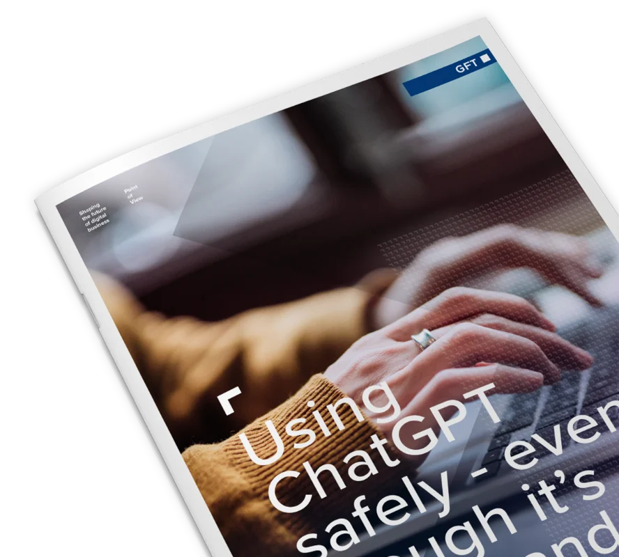 A close-up of a GFT publication titled &quot;Using ChatGPT Safely,&quot; focusing on safe and effective utilisation of ChatGPT, featuring hands typing on a laptop.